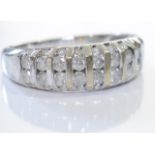 A 1ct White gold diamond ring. With a pave-set diamond tapered band ring. Estimated total diamond