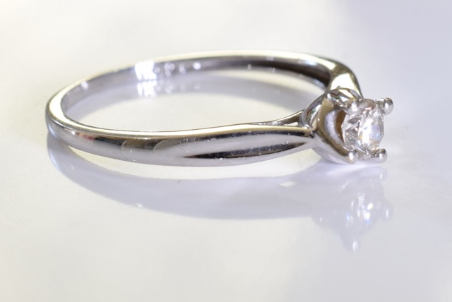 A 9ct gold white gold solitaire ring. A brilliant cut single round diamond set in 9ct white gold. - Image 3 of 4