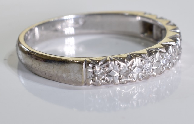 An 18ct white gold diamond ring. A half eternity ring set with brilliant cut diamonds in an 18ct - Image 3 of 4
