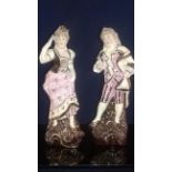 PRETTY PAIR OF BISQUE HAND PAINTED FAIRNGS FIGURINES A lovely pair of figurines hand painted and