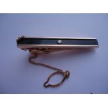 Tie clip: An exceptional vintage 14k Russian gold, black onyx and diamond tie clip. Would make a