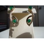 Gorgeous vintage Emerald and diamond 2 in 1 earring! This earring can be worn in 2 ways; as 1 ct