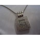 conic Chopard style halo square pendant with 5 floating diamonds. Pendant is encrusted with a