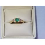 Vintage Emerald 10k Gold and Cubic Zirconia Ring.A vintage style 14k Yellow gold ring with a genuine