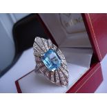 Blue topaz marquis:This unusual sky blue Topaz 10k and diamond ring is a gorgeous colour.