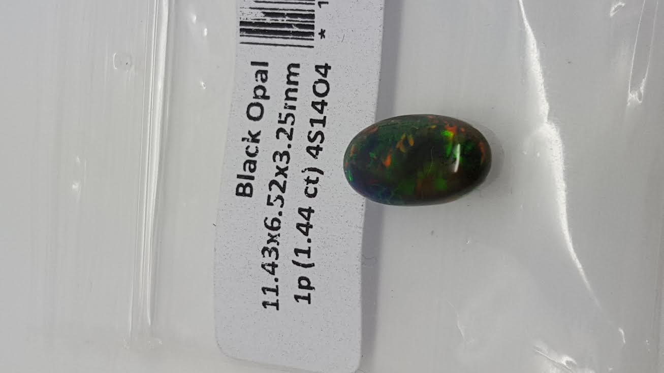 1.44 ct natural loose black opal with play of colour