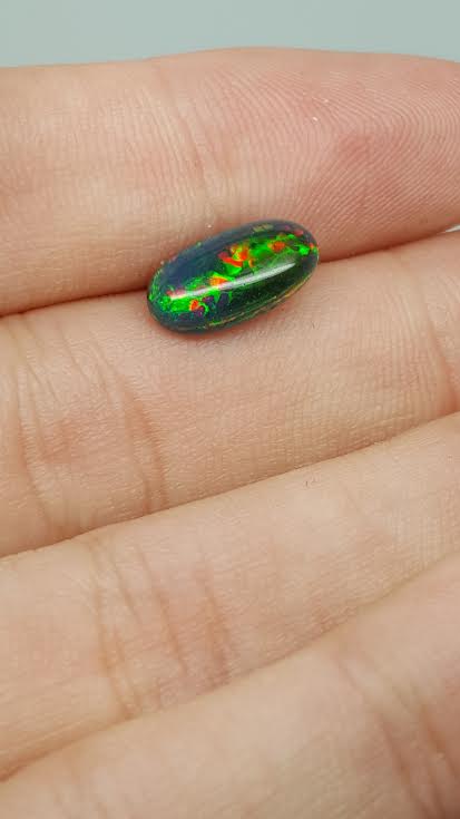 1.44 ct natural loose black opal with play of colour - Image 2 of 2