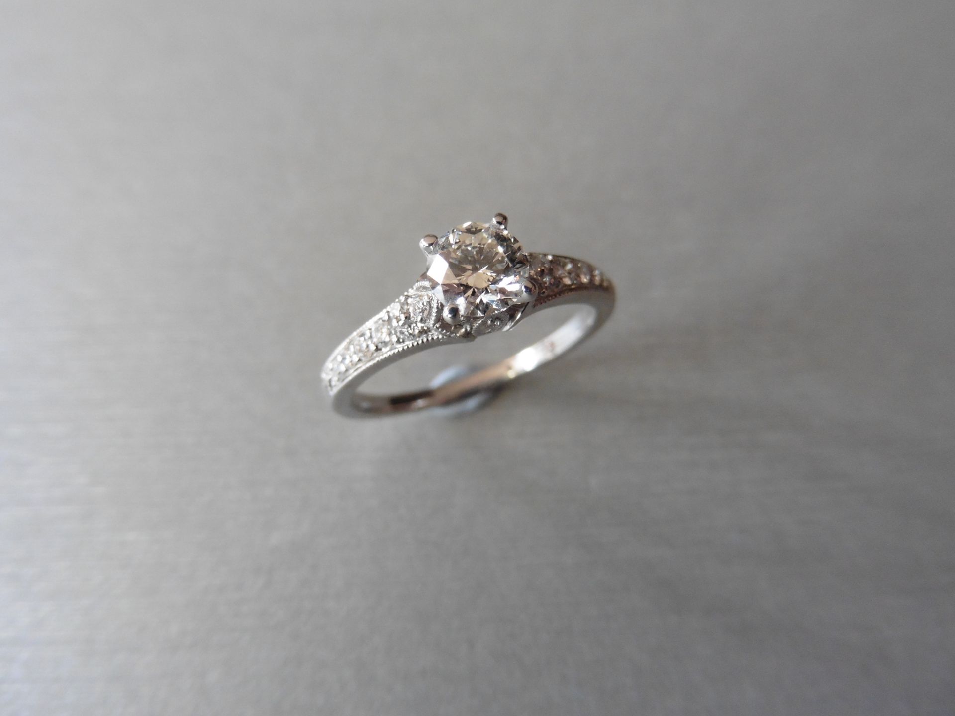 Brand new 18ct white gold diamond set solitaire ring set with a brilliant cut diamond, of Si