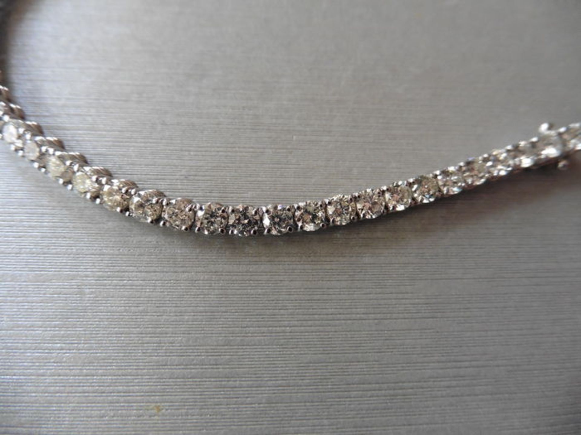 Brand new 18ct white gold tennis bracelet set with brilliant cut diamonds of H/I colour, si3 - Image 3 of 3