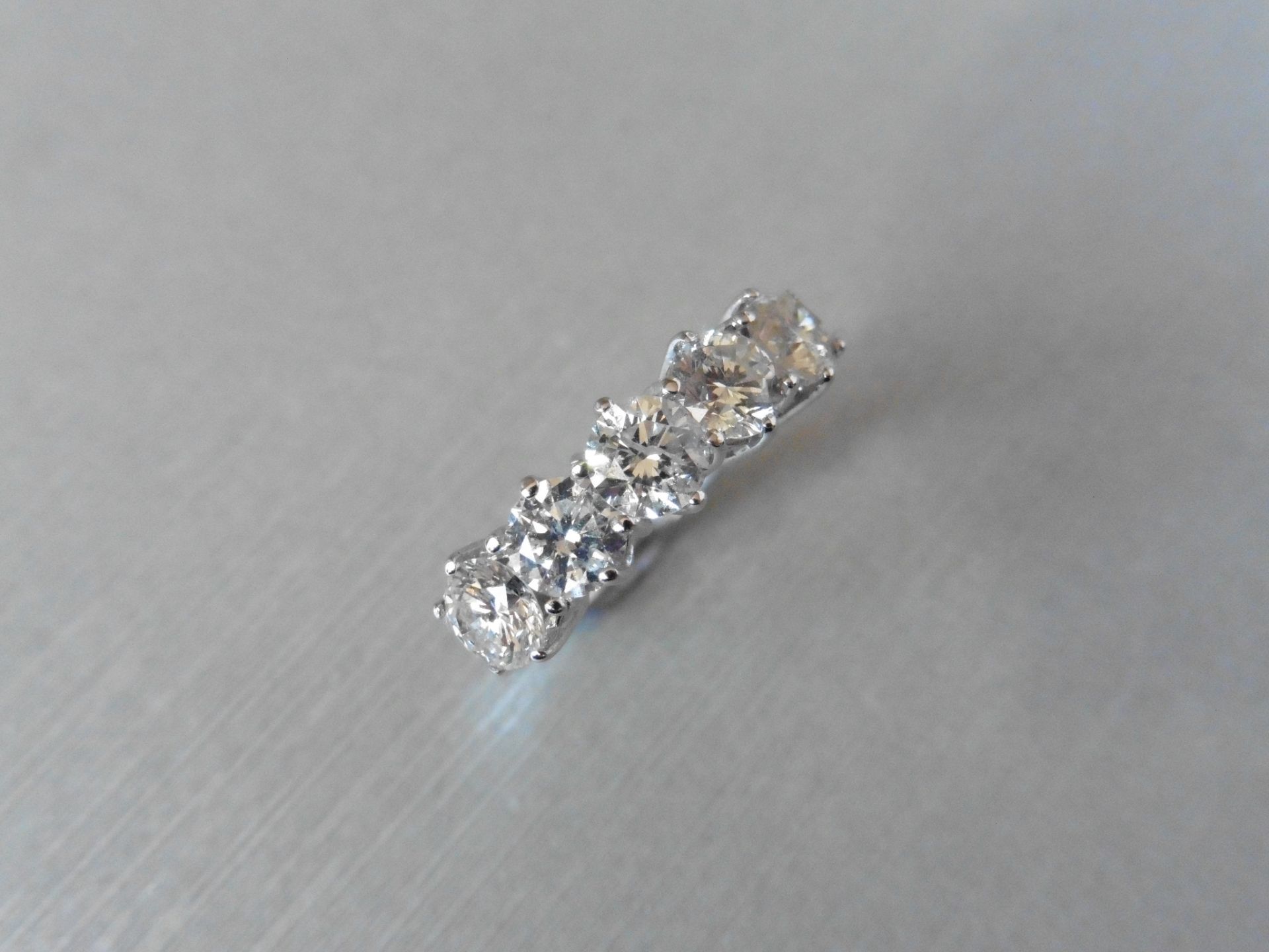 Brand new 18ct gold diamond ring set with five brilliant cut diamonds, i colour, Si3 clarity,