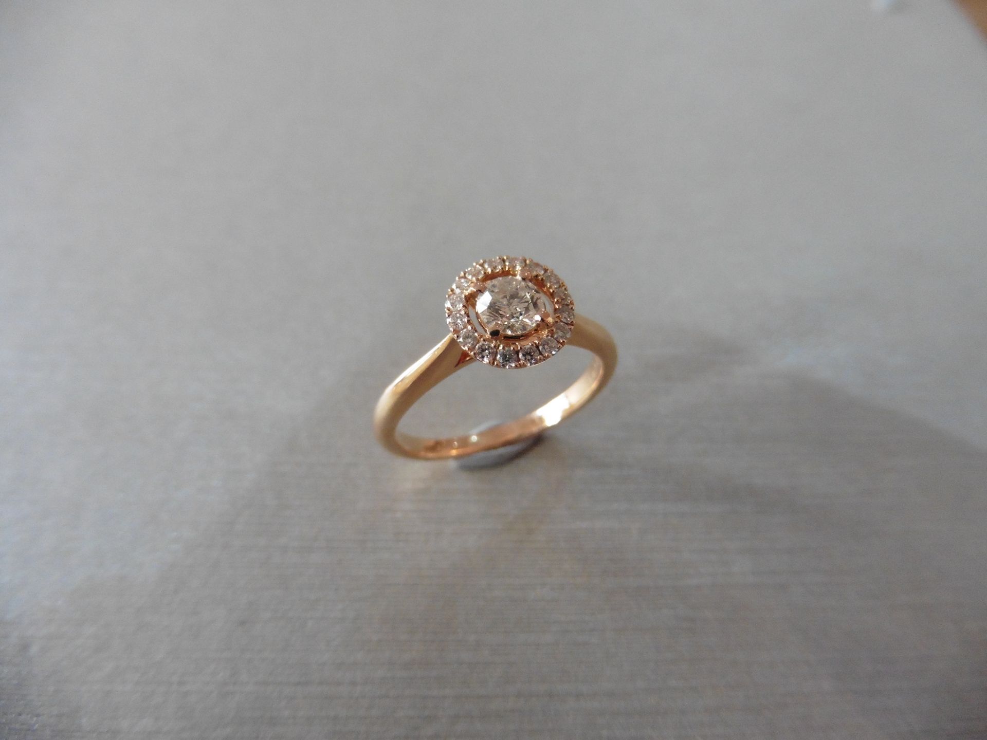 Brand new 18ct rose gold diamond set ring with a 0.30ct brilliant cut diamond, I/J colour which is