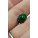 2.82 ct natural loose black opal with play of colour