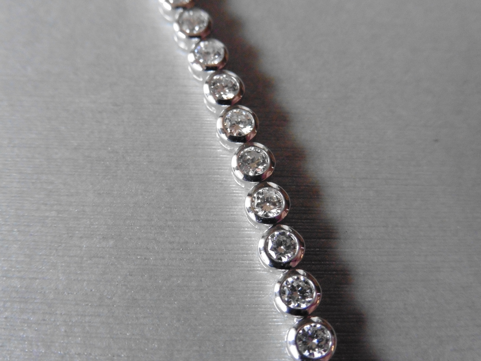 Brand new 18ct white gold diamond tennis style bracelet set with brilliant cut diamonds weighing 5ct - Image 2 of 4