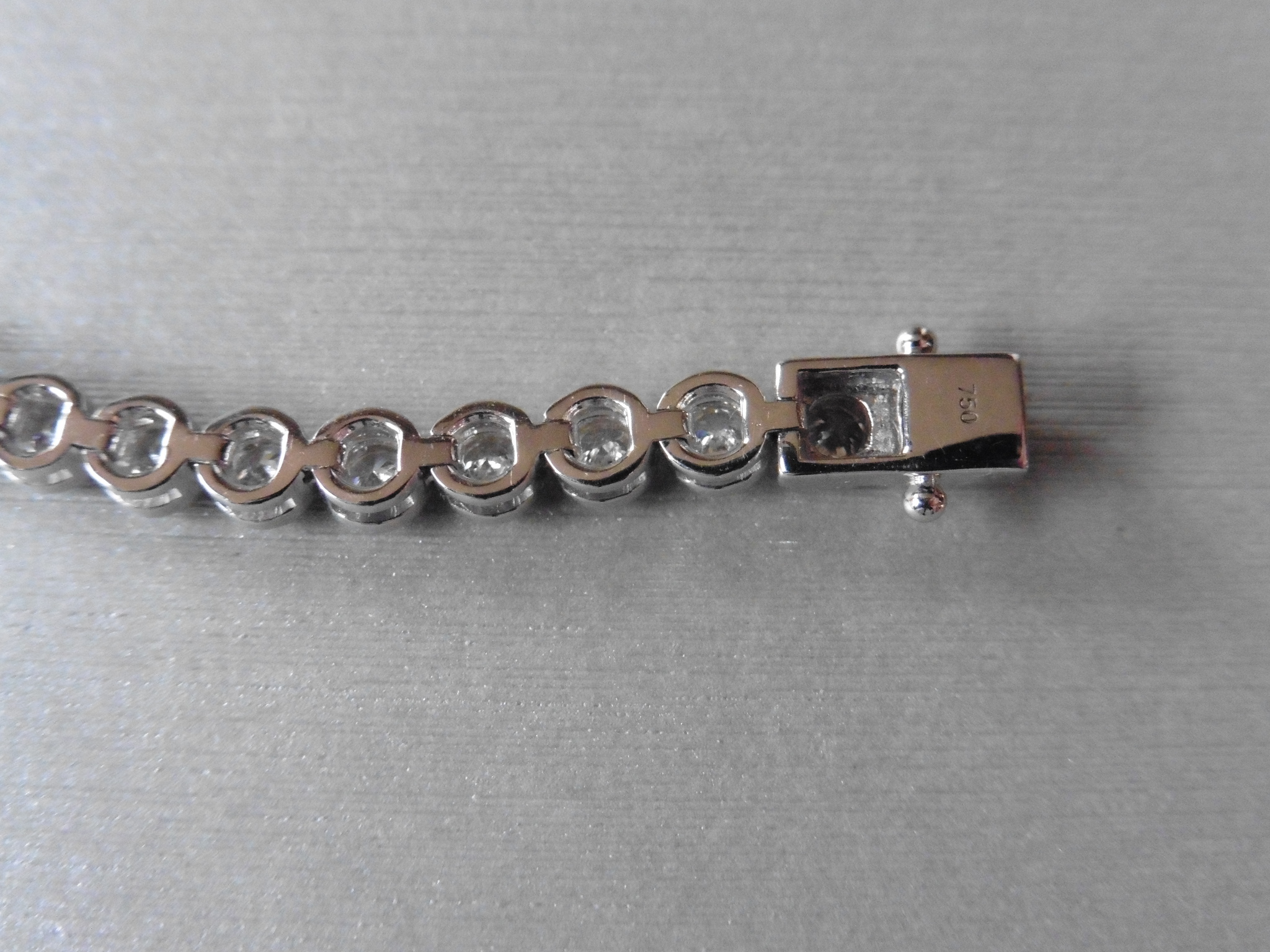 Brand new 18ct white gold diamond tennis style bracelet set with brilliant cut diamonds weighing 5ct - Image 4 of 4