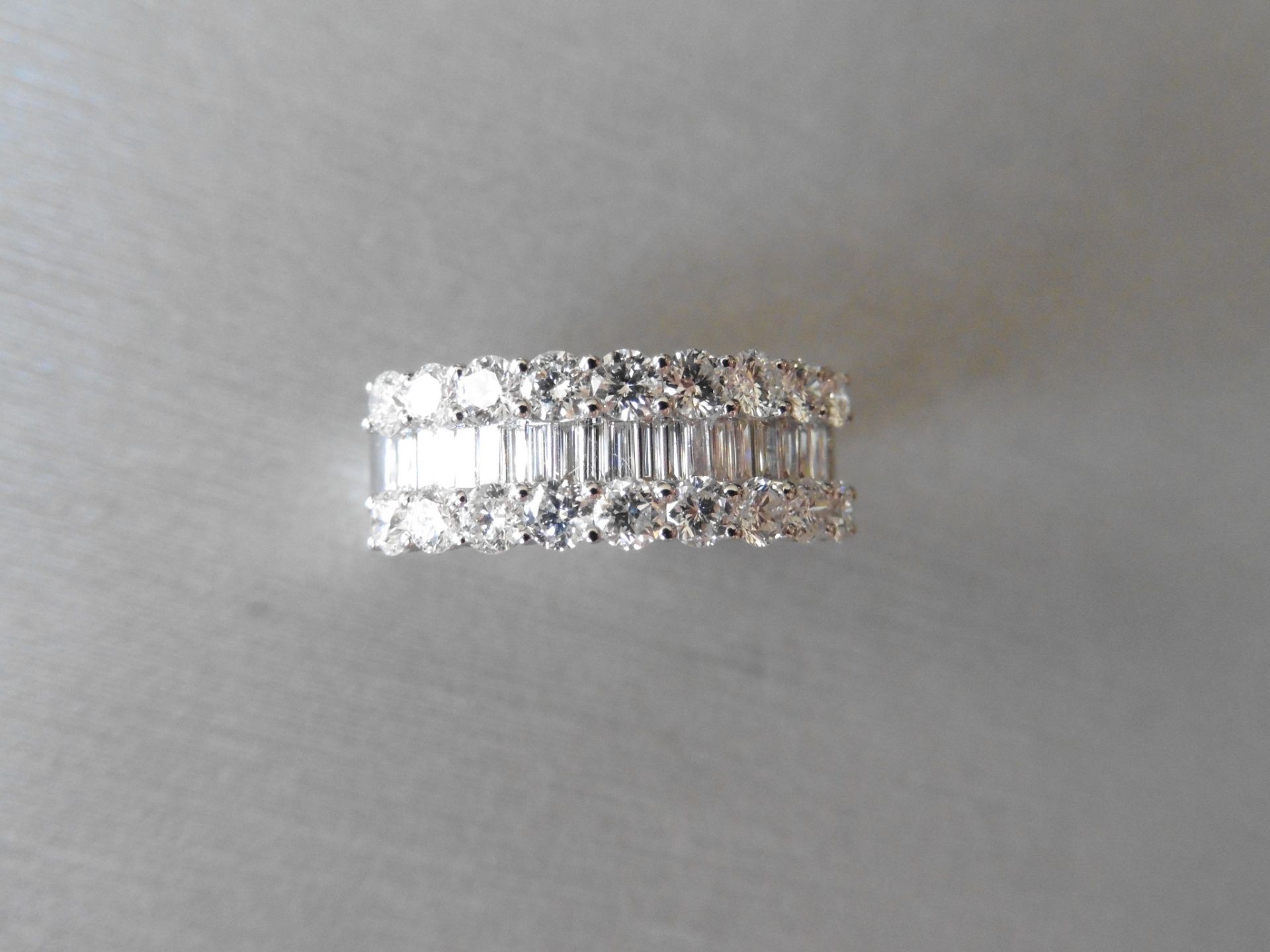 18ct white gold diamond band dress ring. Set with 3 rows of diamonds, 2 rows of brilliant cut - Image 2 of 4