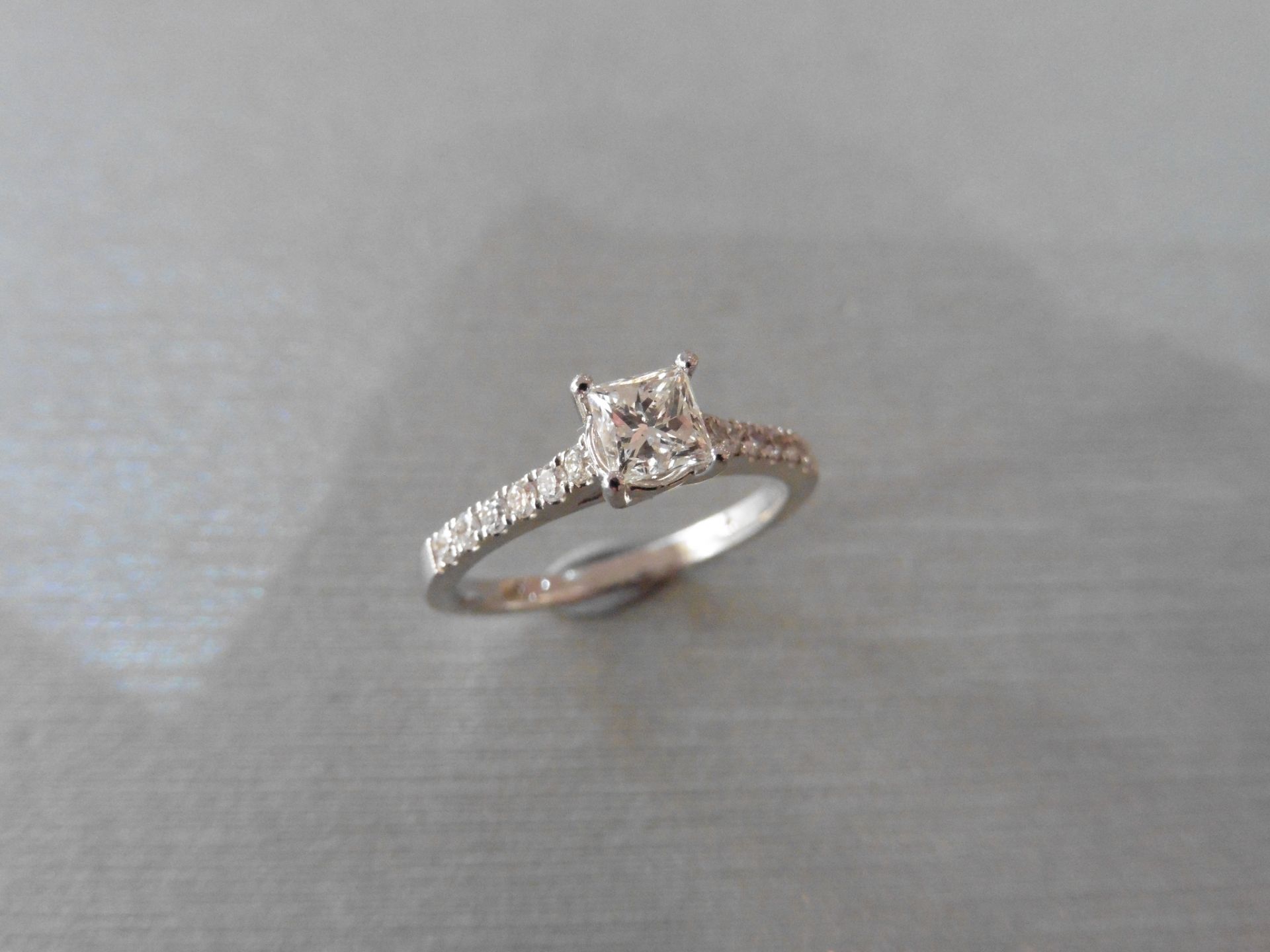 Princess cut diamond set solitaire 0.50ct, H colour and Si2 clarity in a four claw setting. The
