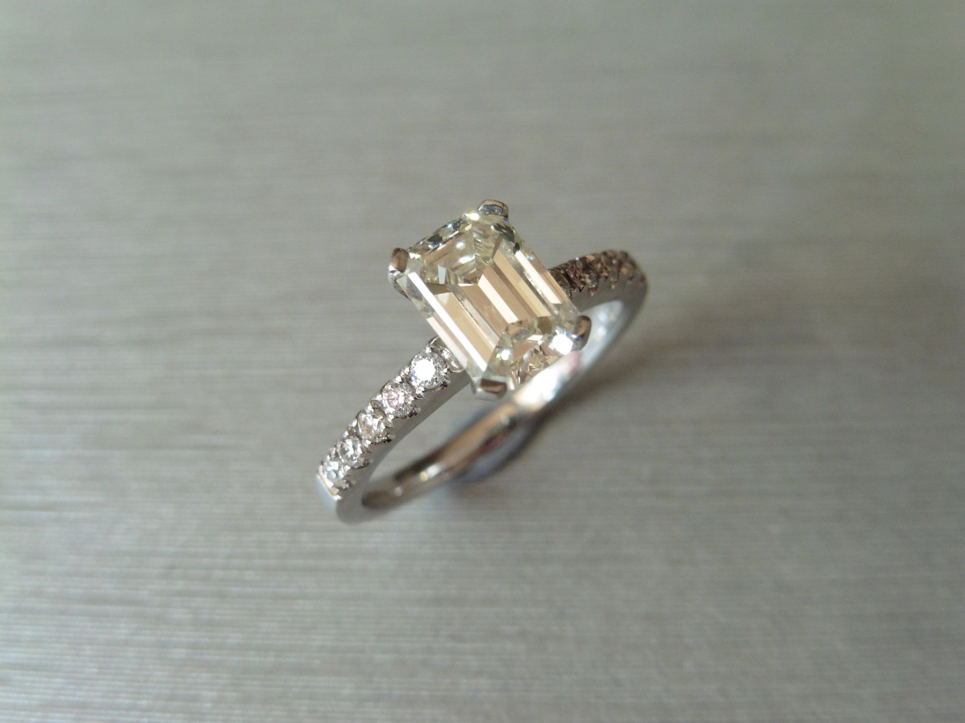 1.50ct emerald cut diamond solitaire ring. Centre stone is I/J colour and VS clarity. Four claw