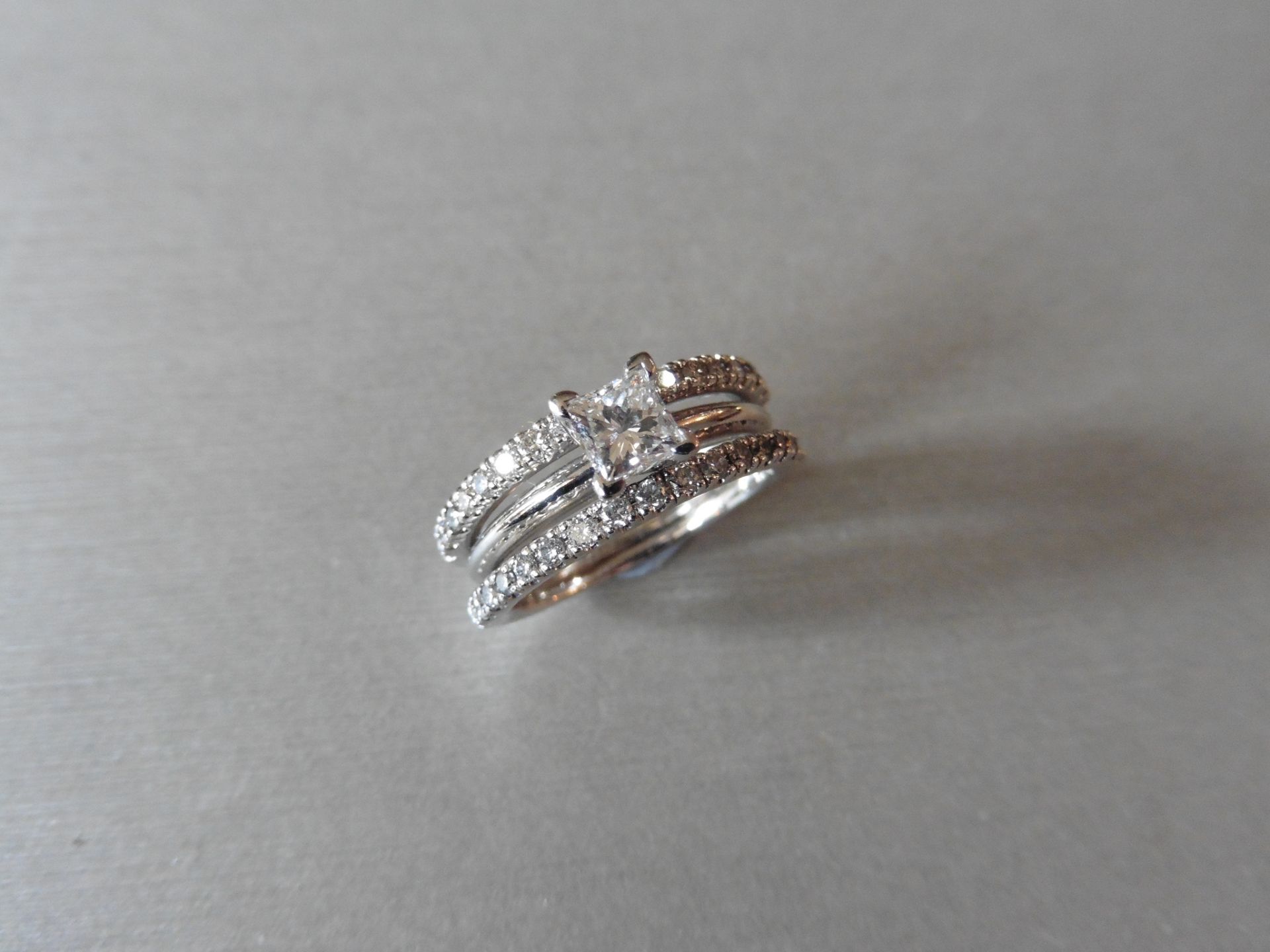 14ct white gold ring set. This is 3 rings that have been joined together compromising of 2 diamond