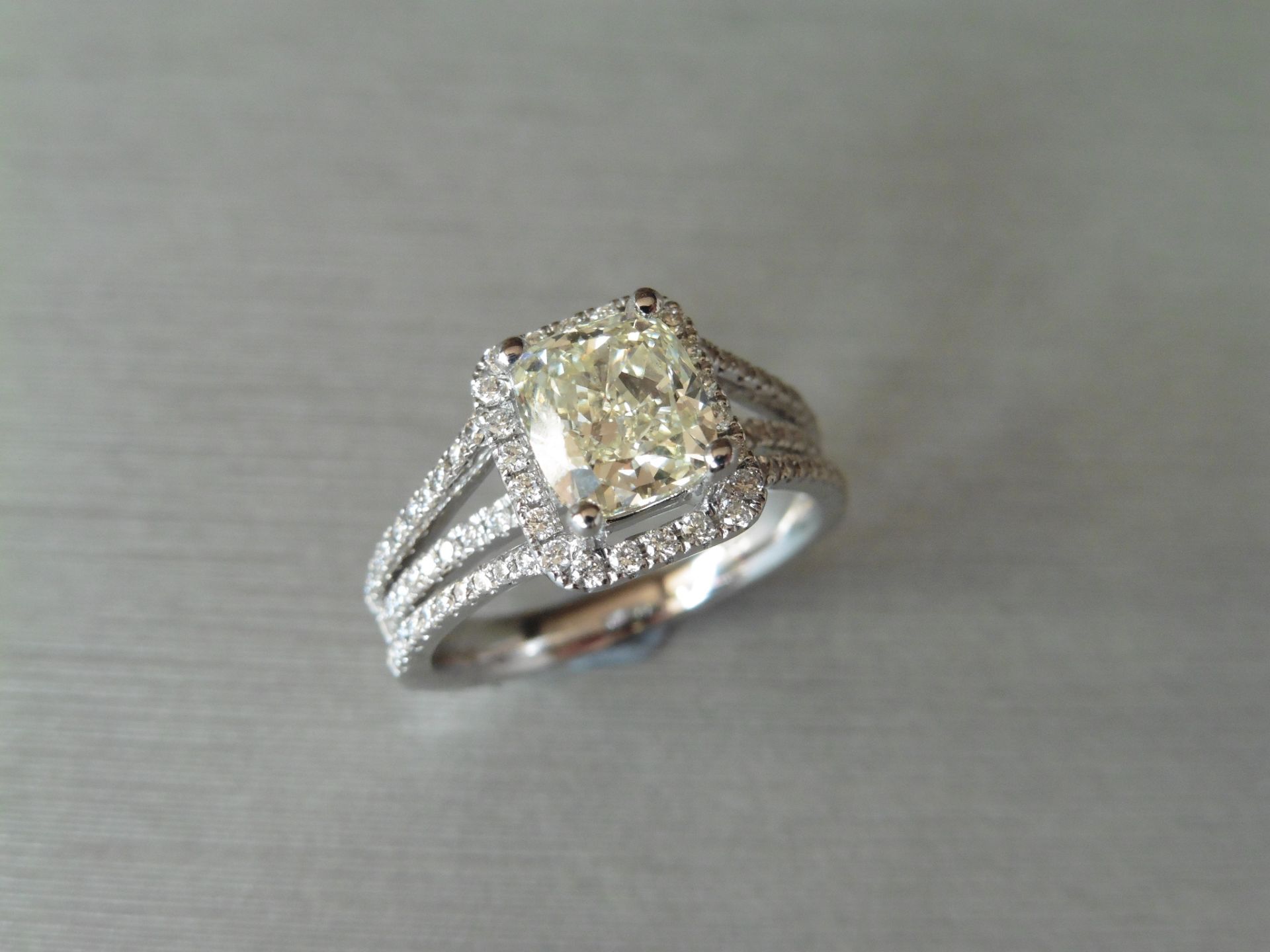 1.70ct diamond solitaire ring. Centre stone is a 1.70ct radiant cut diamond, fancy light yellow