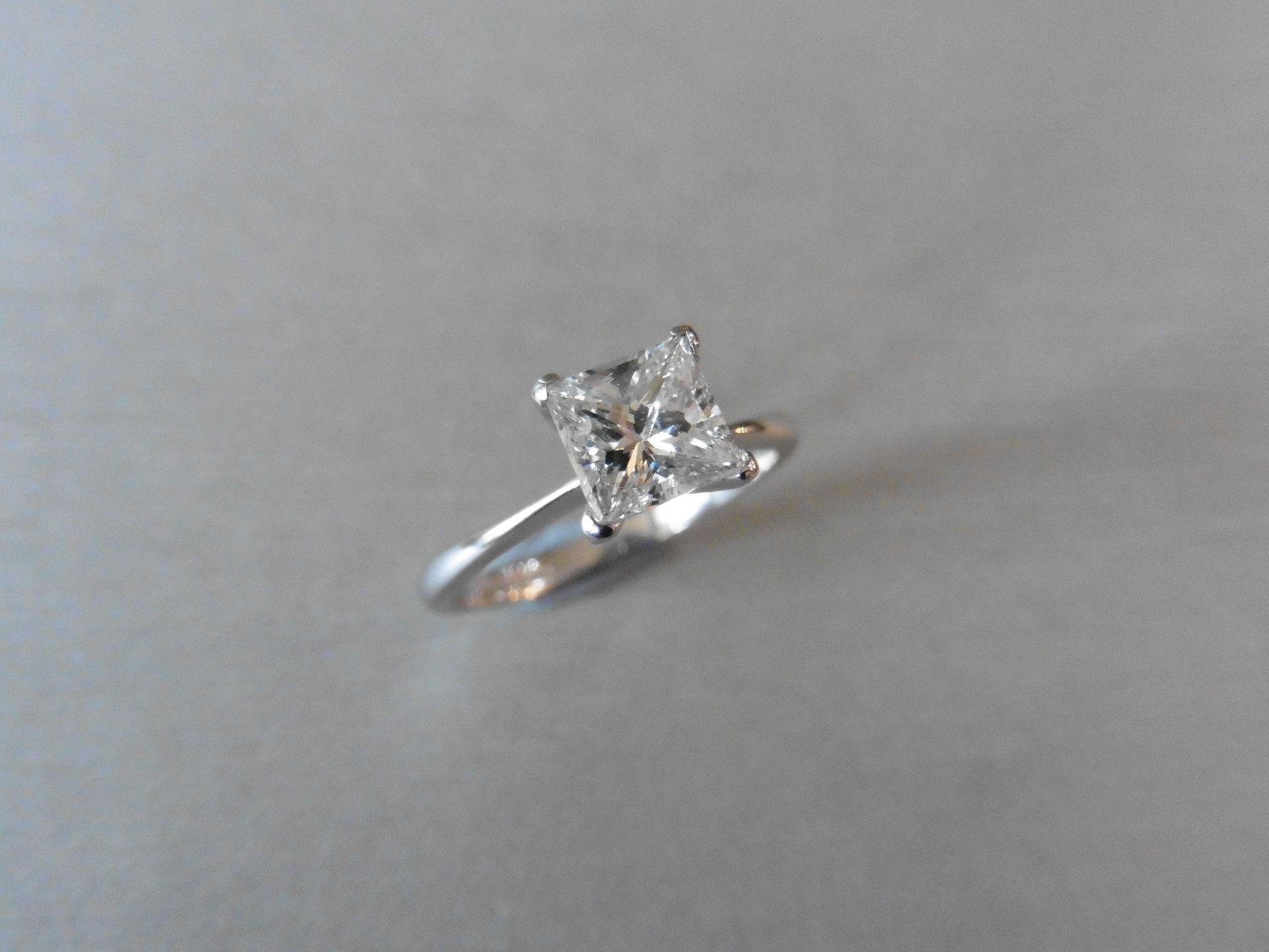 0.90ct princess cut diamond solitaire ring. H colour, si clarity. This diamond has been enhanced.