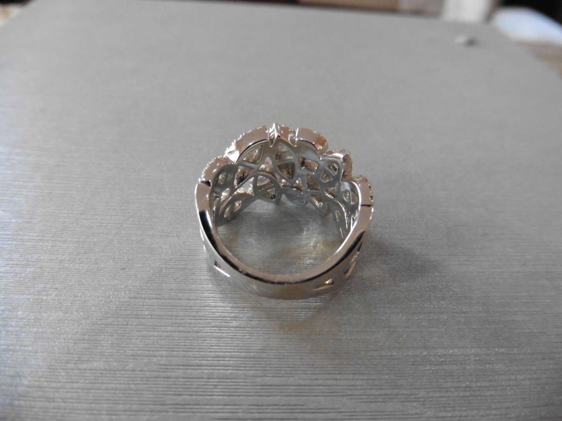 Wide diamond dress ring set with small various cut diamonds, H colour and Si clarity. Set with - Image 2 of 5