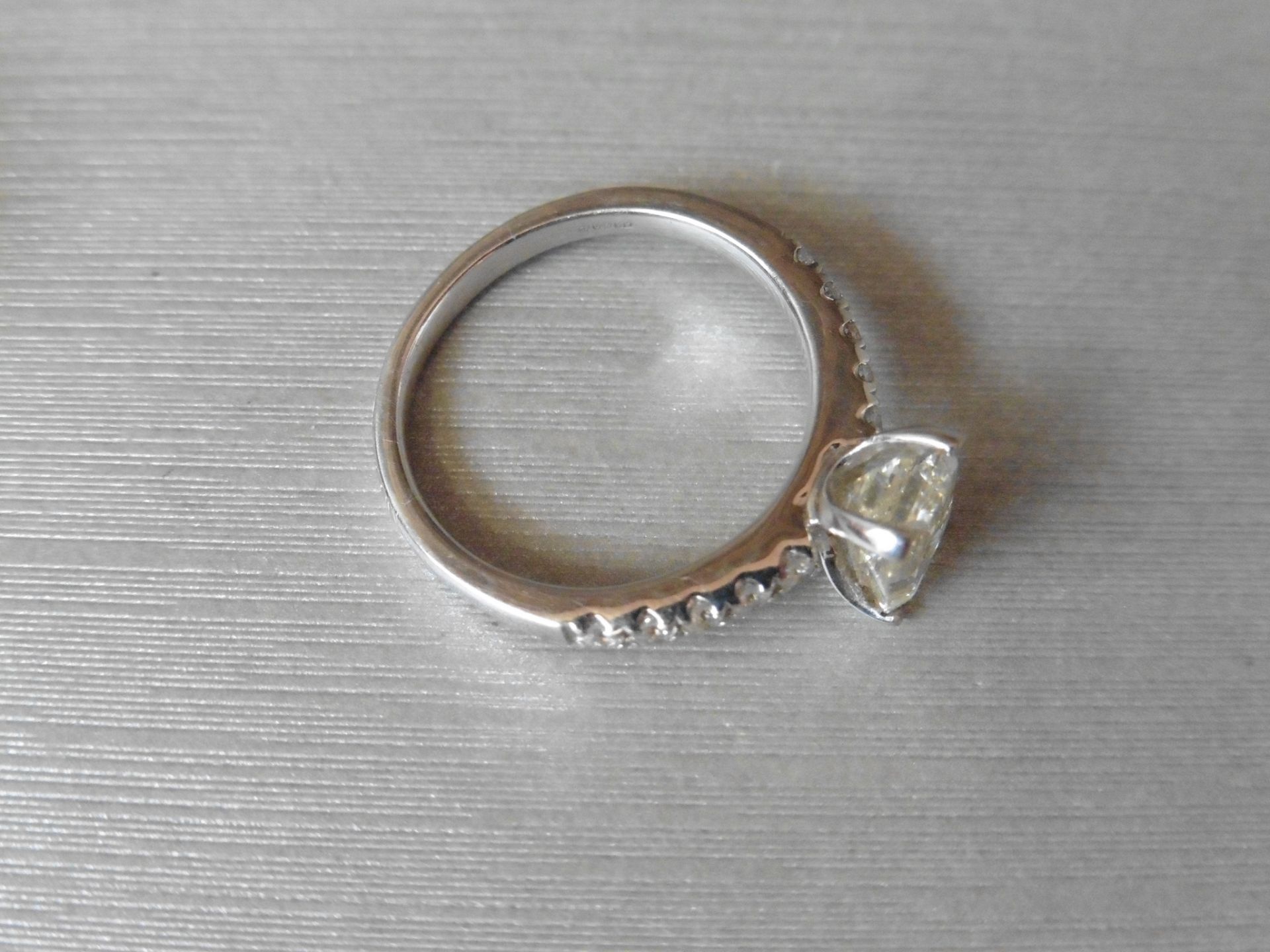 1.50ct emerald cut diamond solitaire ring. Centre stone is I/J colour and VS clarity. Four claw - Image 4 of 5