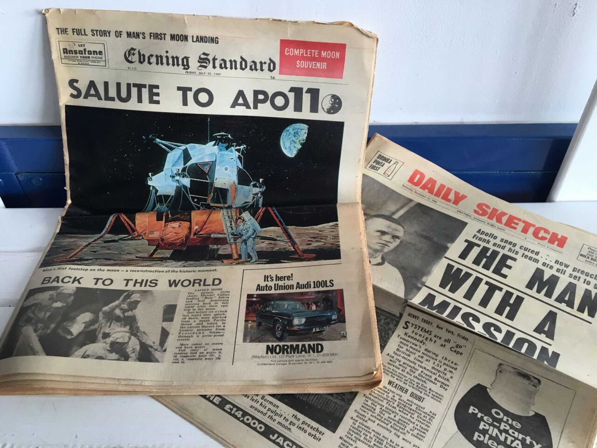 ORIGINAL 1969 NEWSPAPER - MOON LANDING SOUVENIR COPY WITH COLOURED PICTURES TOGETHER WITH ONE OTHER.