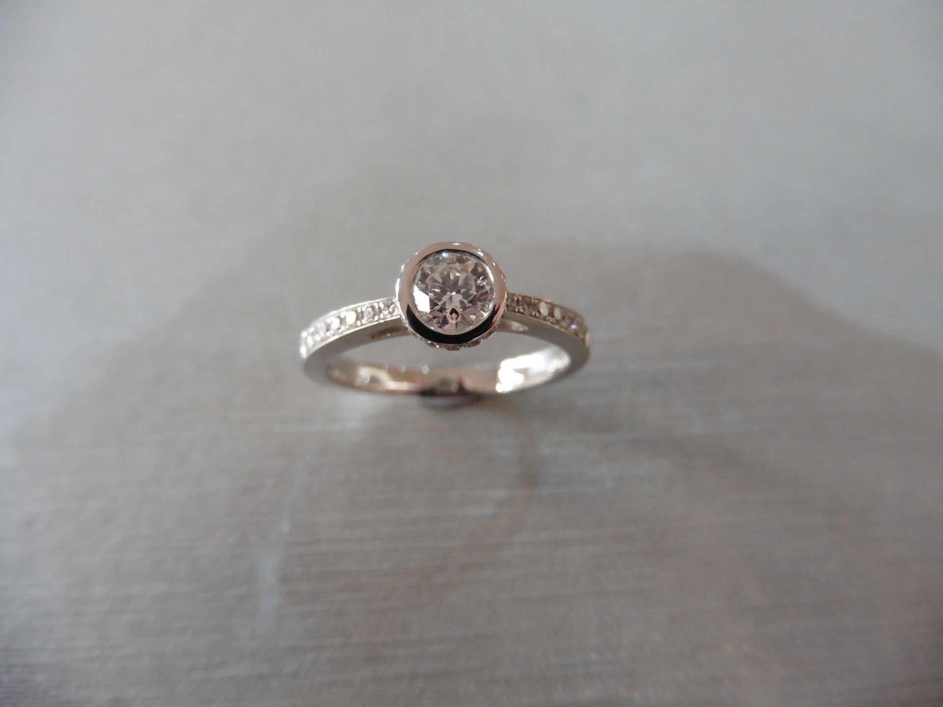 18ct white gold diamond set solitaire ring with a Brilliant cut diamond weighing 0.41ct secured in a - Image 4 of 4