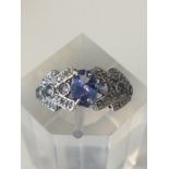 Pretty 0.73ct Genuine Tanzanite and 16PCS Genuine Diamons 10K Solid Gold White Gold RingPretty 0.