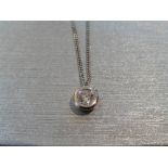 Solitaire diamond pendant set with a 0.40ct brilliant cut diamond. Set in a heavy rub over setting