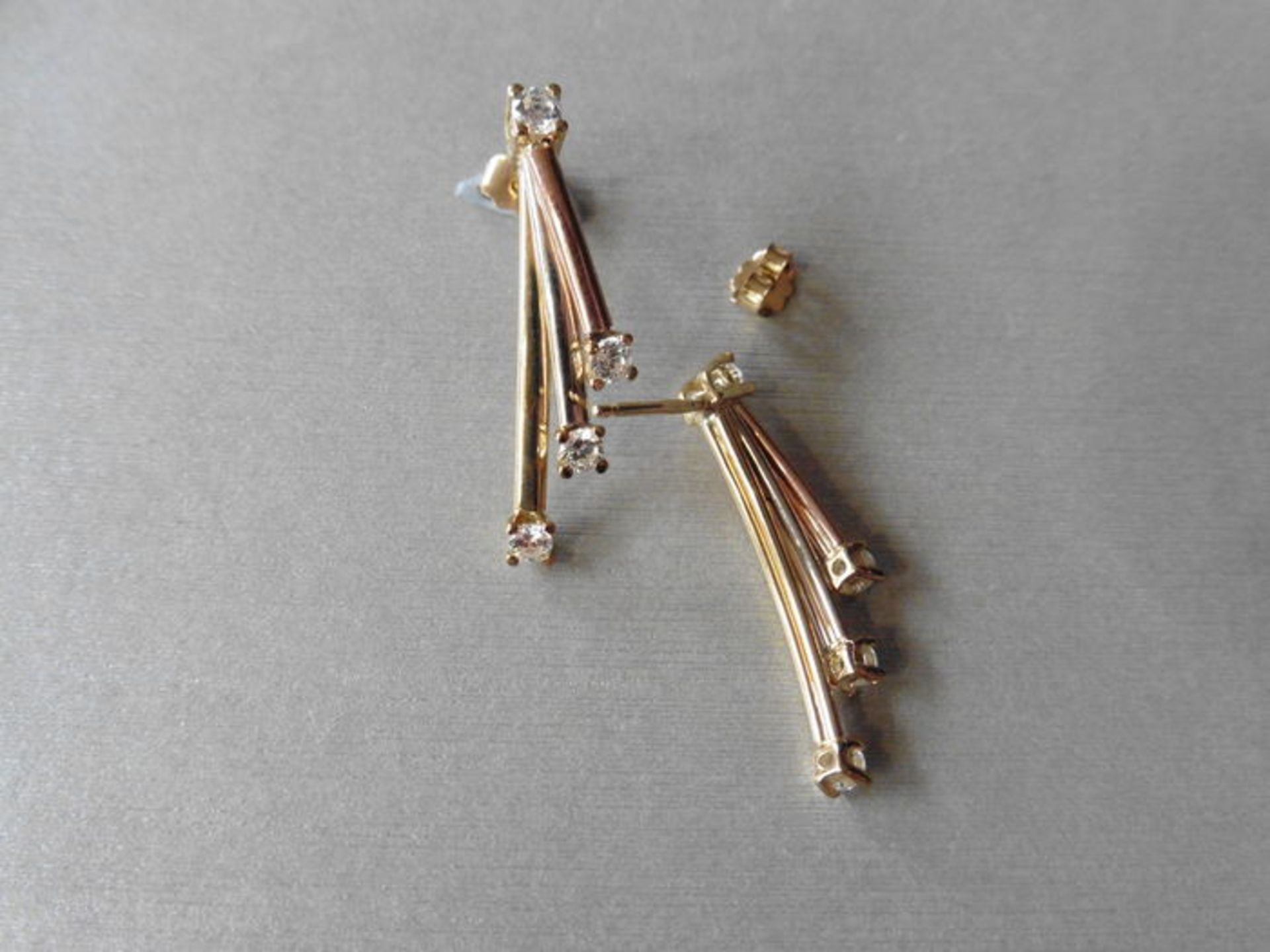 9ct gold diamond set drop style earrings. Set with white, rose and yellow gold bars with a small - Image 5 of 5