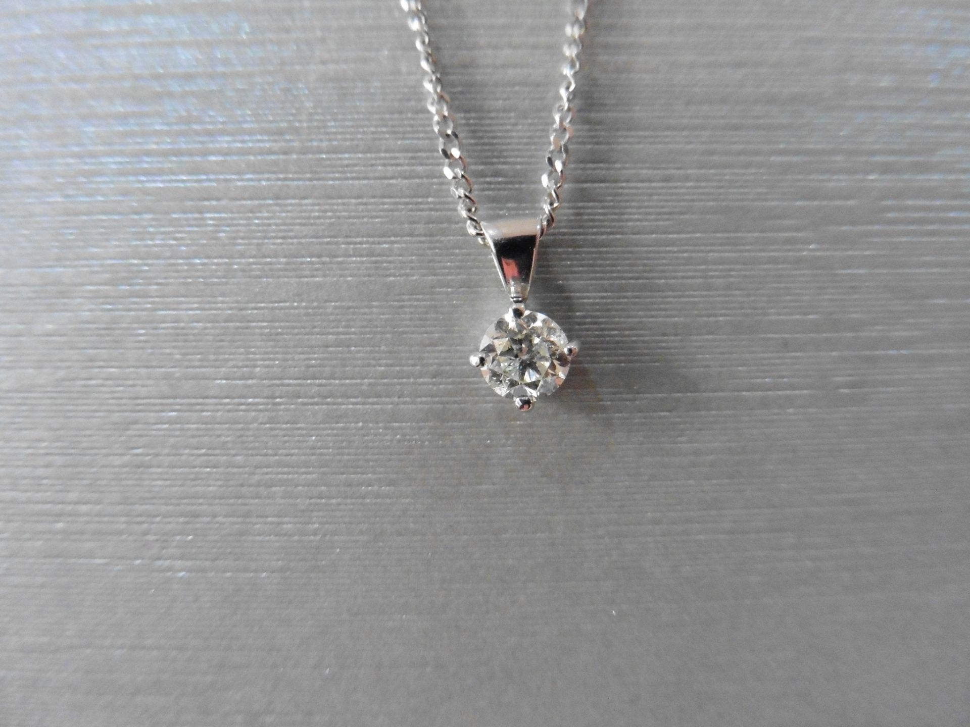 diamond solitaire pendant set with a 0.30ct brilliant cut diamond, H/I colour, si3 clarity. Four - Image 3 of 3