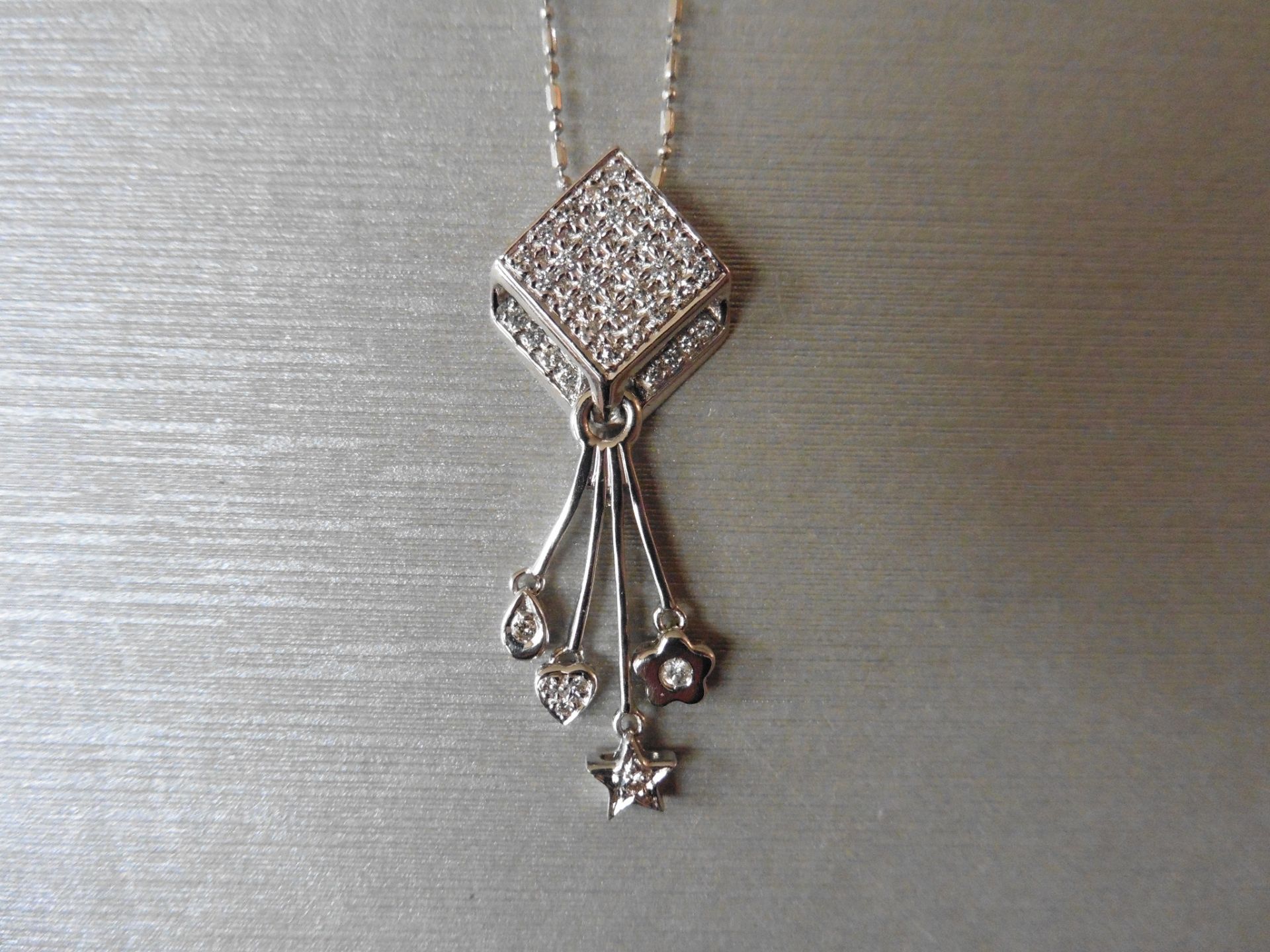 18ct white gold fancy drop pendant. Diamond shaped design at the top which is micro set with tiny - Image 5 of 5