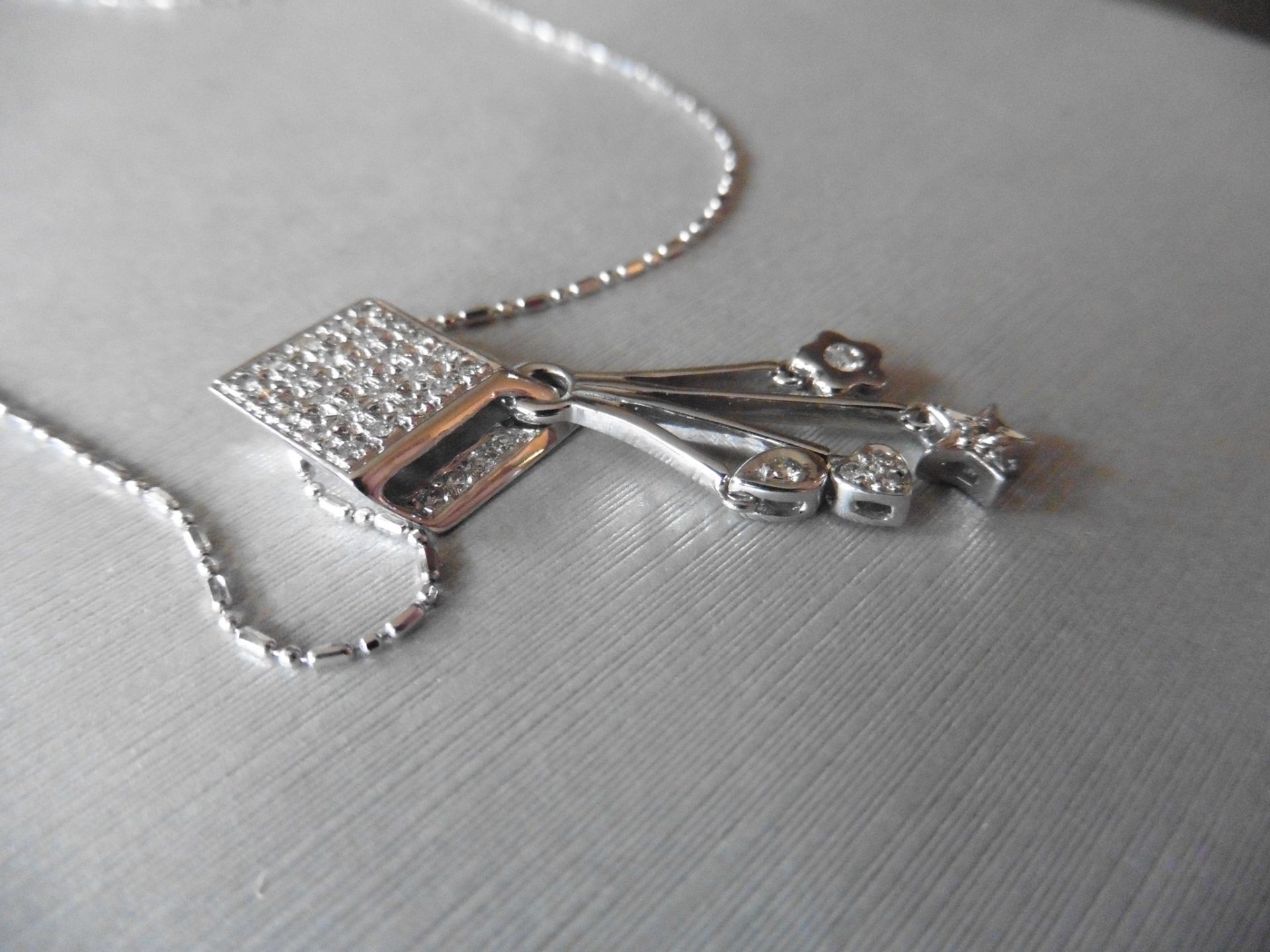 18ct white gold fancy drop pendant. Diamond shaped design at the top which is micro set with tiny - Image 3 of 5