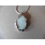 Opal and diamond drop pendant and chain. Oval shaped opal measuring approximately 26mm x 18mm.
