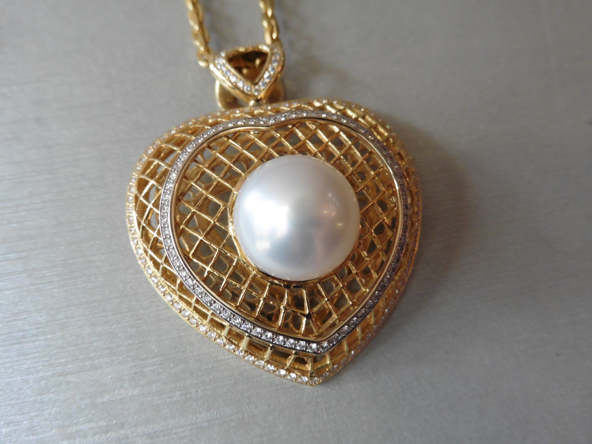 18ct yellow gold pearl and diamond heart shaped pendant. Centred white pearl measuring approximately - Image 6 of 6