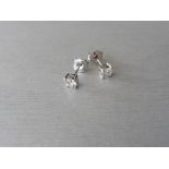 Solitaire diamond stud earrings each set with a brilliant cut diamond weighing a total of 0.82ct.