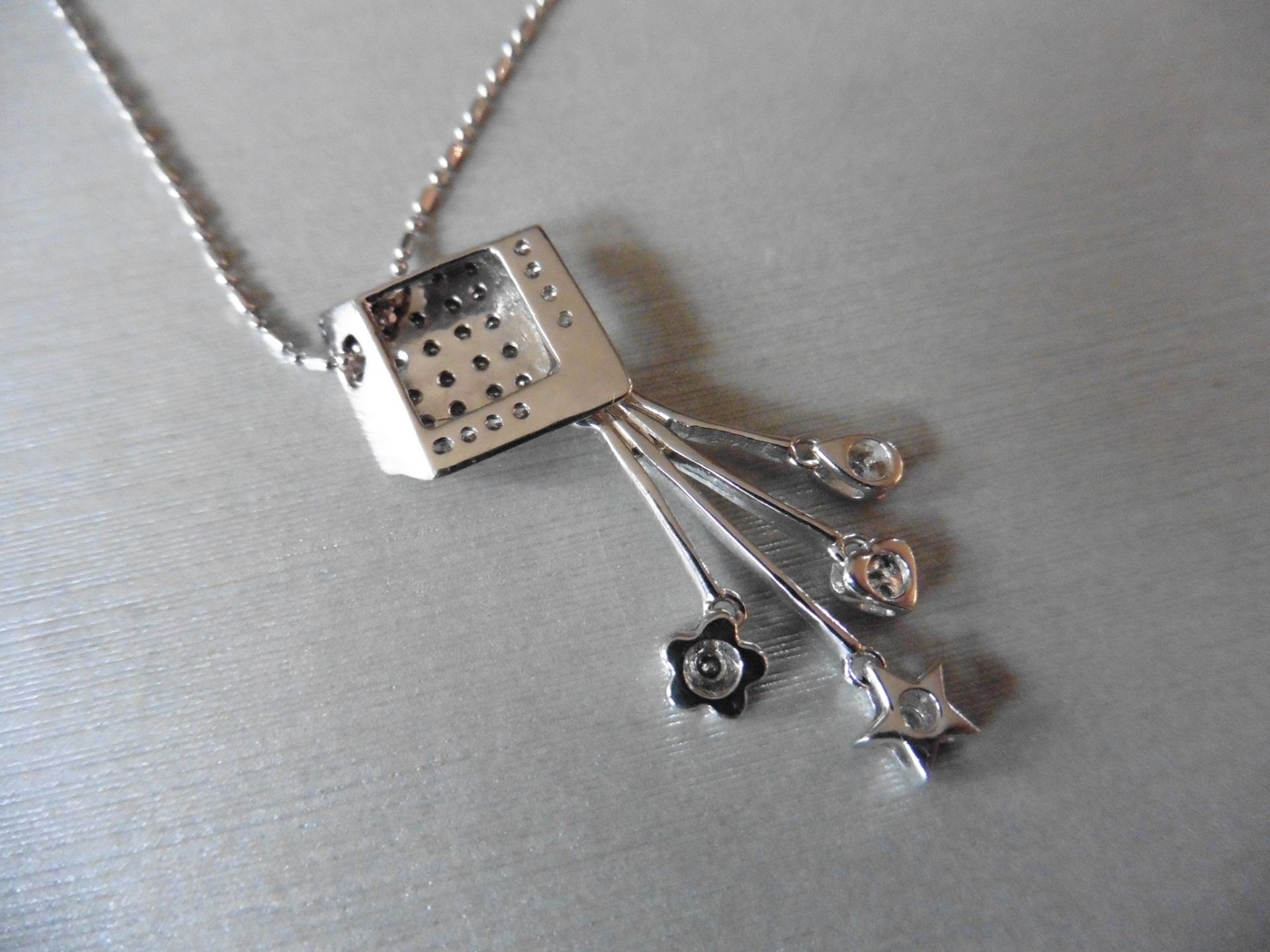 18ct white gold fancy drop pendant. Diamond shaped design at the top which is micro set with tiny - Image 4 of 5