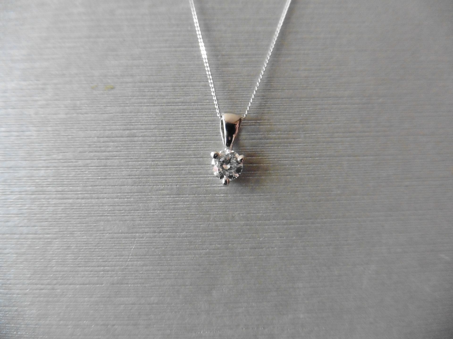 Diamond solitaire style pendant set with a 0.25ct brilliant cut diamond, I colour and Si3 clarity.