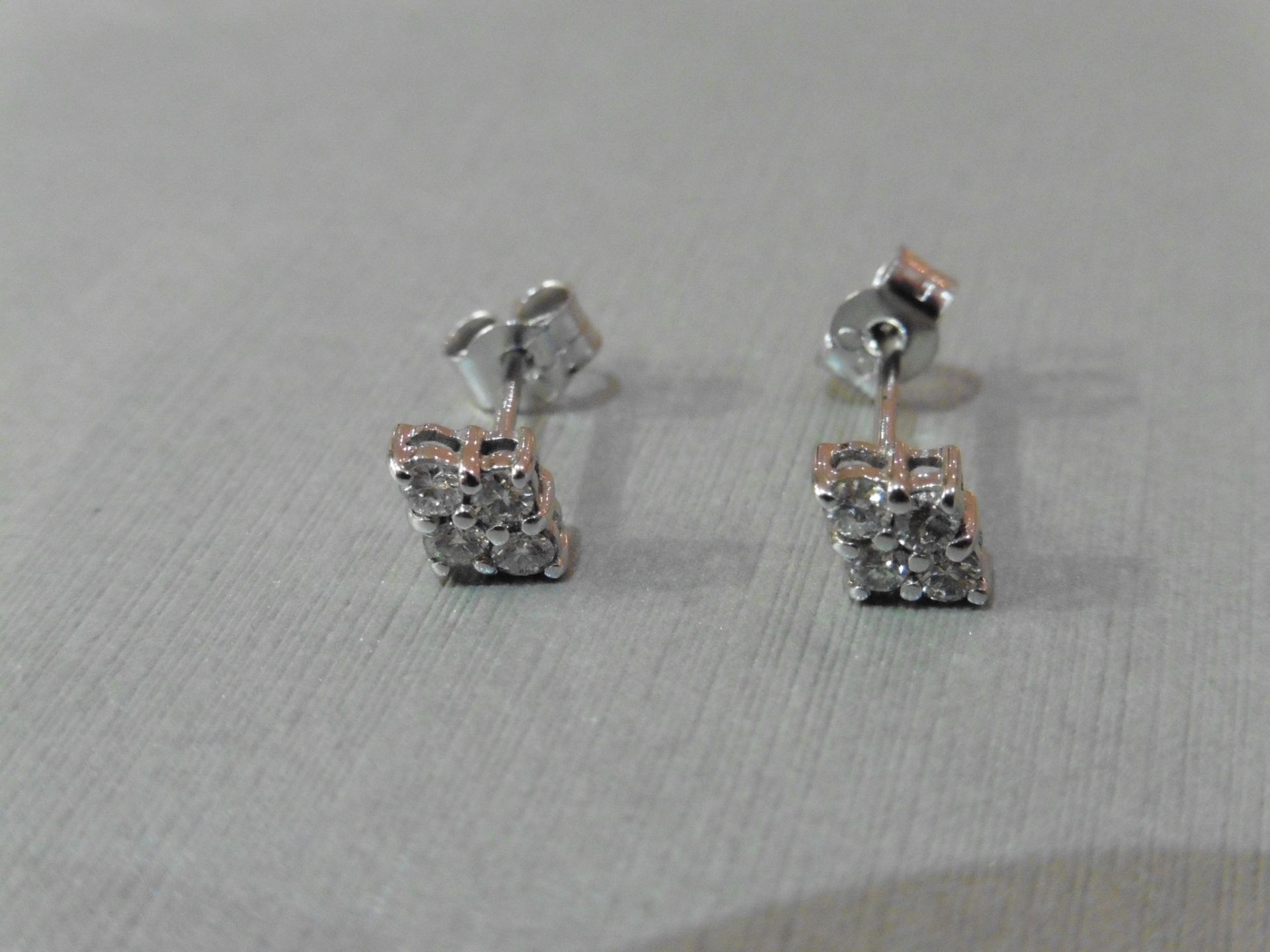 18ct white gold diamond cluster style earrings each set with 4 small brilliant cut diamonds, H - Image 4 of 4