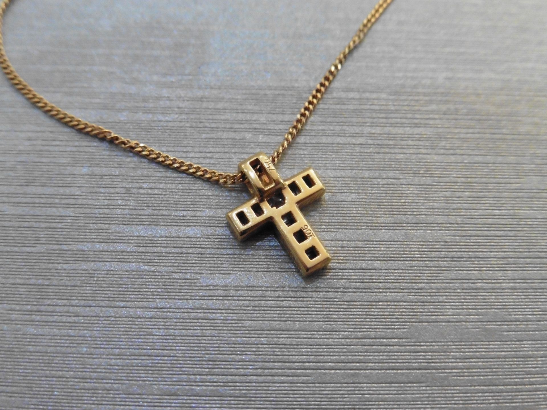 Diamond cross pendant set with 1 small princess cut diamond in the centre and surrounded by baguette - Image 3 of 3