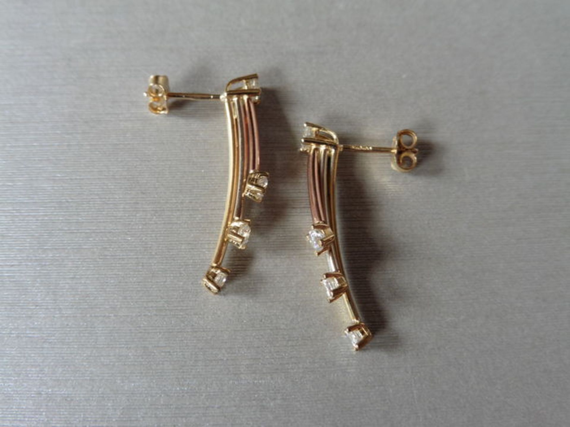 9ct gold diamond set drop style earrings. Set with white, rose and yellow gold bars with a small - Image 2 of 5