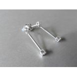 Diamond drop style earrings. Each bottom bar is set with a brilliant cut diamond, 0.35ct each, in