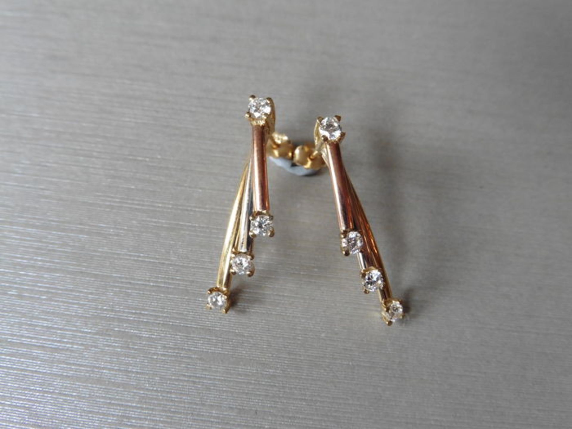 9ct gold diamond set drop style earrings. Set with white, rose and yellow gold bars with a small - Image 3 of 5