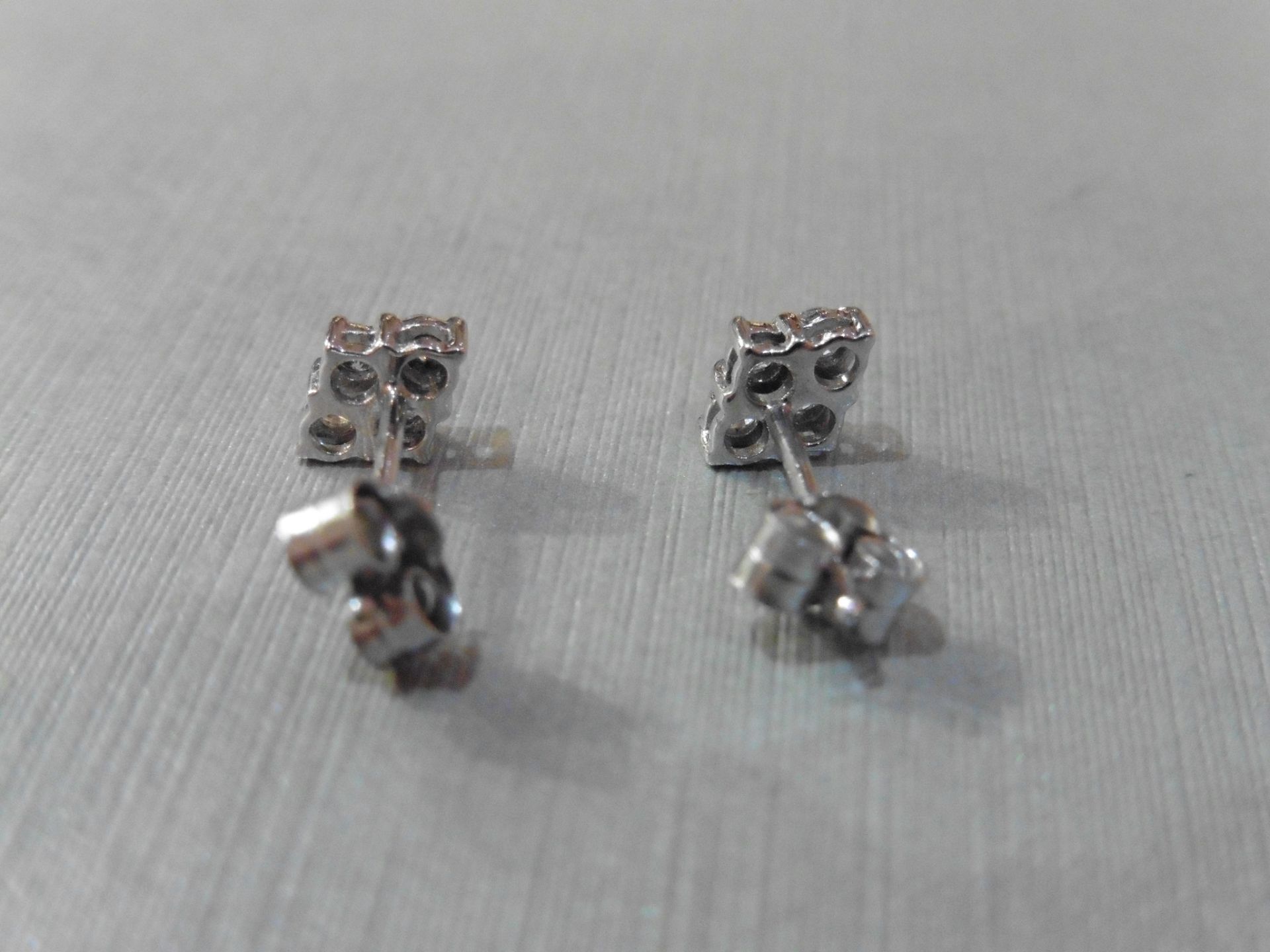 18ct white gold diamond cluster style earrings each set with 4 small brilliant cut diamonds, H - Image 2 of 4