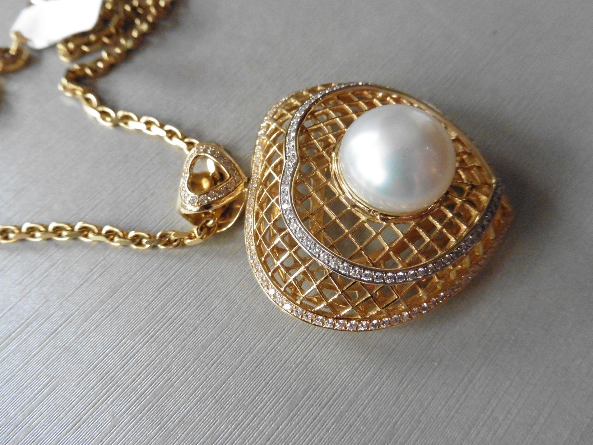 18ct yellow gold pearl and diamond heart shaped pendant. Centred white pearl measuring approximately - Image 2 of 6