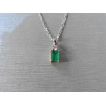 Emerald and diamond pendant set with an emerald cut emerald weighing 2.00ct with a small 0.10ct