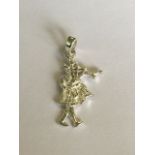 SILVER (STAMPED 925) CHARM OR PENDANT IN THE FORM OF A SCOTTISH PIPER. APPROX 2CM. FREE UK DELIVERY.