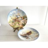 PAIR OF CROWN STAFFORDSHIRE LIMITED EDITION CHRISTMAS PLAQUES/PLATES DECORATED WITH BIRDS IN RELIEF.