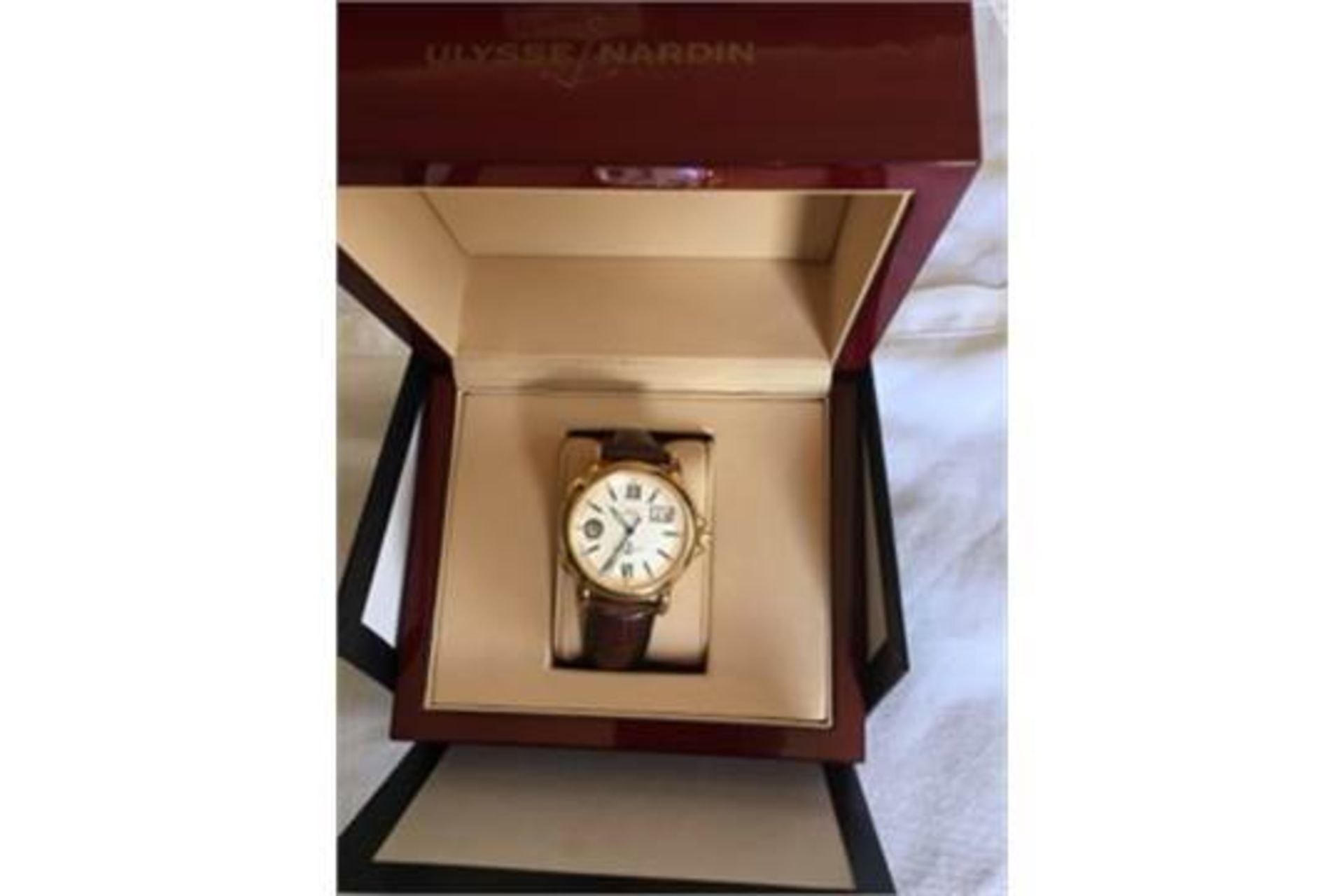 ULYSSE NARDIN GMT +/- IN 18K GOLD CASE WITH 18K DEPLOYANT CLASP